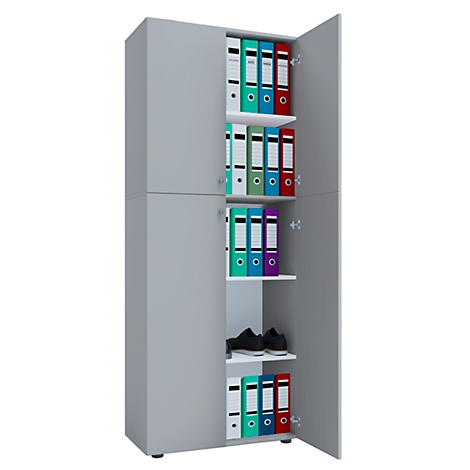 Gray filing cabinet with open door filled with folders of various colors and a pair of shoes.