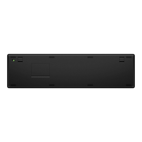 Schwarze Tastatur-Rückseite, grüne LED-Anzeige, Akkufach, mehrere Aussparungen.