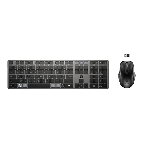 Draufsicht auf ein drahtloses HP-Tastatur- und Maus-Set mit silbernen Tasten und einer schwarzen Maus mit einem USB-Dongle.