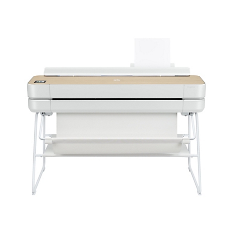 Ein weißer Plotter mit Holz-Optik-Oberfläche und Papierausgabe.