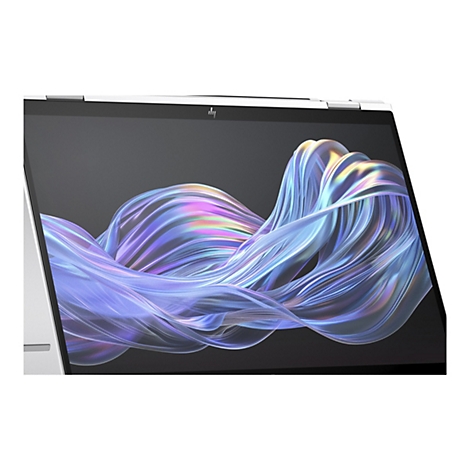 Nahaufnahme eines Laptops mit einem bunten, wellenartigen Muster auf dem Bildschirm.