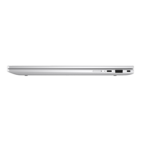 Seitenansicht eines silberfarbenen Laptops. Die Kanten sind abgerundet. Auf der Seite sind Anschlüsse zu sehen.
