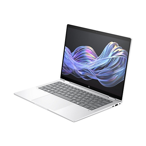 Ein silberner Laptop mit geöffnetem Bildschirm, der abstrakte, farbige Formen zeigt. Die Tastatur ist hellgrau.