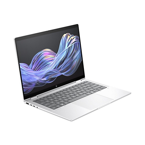 Ein silbernes Laptop mit geöffnetem Bildschirm. Auf dem Bildschirm werden blau-violette Wirbellinien gezeigt. Die Tastatur ist hellgrau.