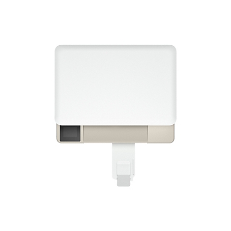 Vue de dessus d'un appareil rectangulaire blanc aux bords arrondis. Une prise blanche se trouve en bas à droite.