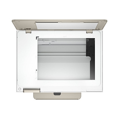 Vue de dessus d'un scanner blanc avec un couvercle légèrement ouvert. Intérieur beige du couvercle, élément de numérisation noir, boîtier blanc.