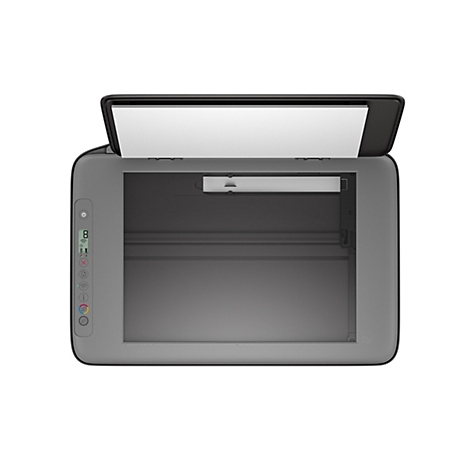 Vue de dessus d'un scanner gris ouvert avec un intérieur blanc. Les boutons de fonction sont situés à gauche.