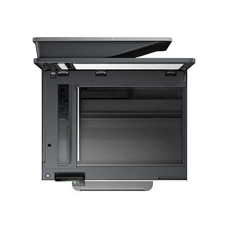 Draufsicht auf einen grauen Multifunktionsdrucker mit geöffnetem Deckel. Auf der Oberfläche sind Größenangaben in cm und Zoll aufgedruckt.