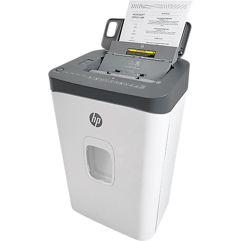 A white and gray HP paper shredder. Paper is being fed into the shredder. Details of the machine are clearly visible.