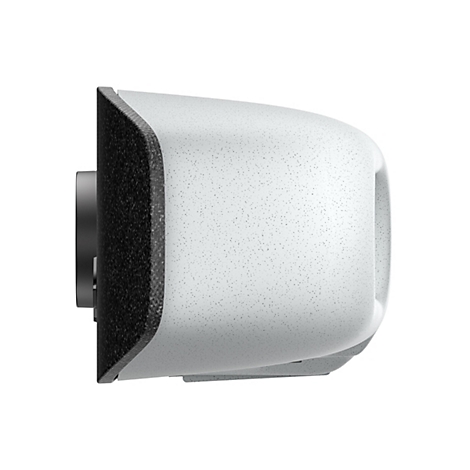 Detailaufnahme eines weißen, abgerundeten Objekts mit gesprenkelter Oberfläche. Links ein schwarzer, strukturierten Abschnitt, dahinter ein grauer Zylinder.