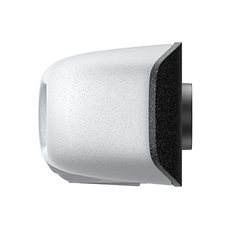 Ein abgerundetes, weißes Gerät mit einer strukturierten, schwarzen Oberfläche an der Seite. Die Oberfläche ist mit winzigen, grauen Punkten bedeckt.