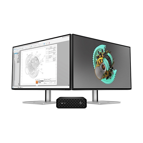 Zwei Monitore zeigen technische Zeichnungen und 3D-Modelle eines Zahnradgetriebes, daneben ein schwarzer Desktop-PC.