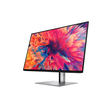 Moderner PC-Monitor mit dünnem Rahmen auf silbernem Standfuß, zeigt ein abstraktes, farbenprächtiges Muster.