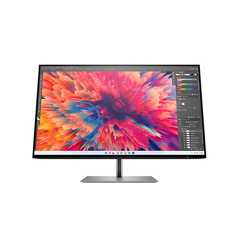 Ein moderner Monitor mit einem leuchtend abstrakten Grafikdesign in Photoshop vor weißem Hintergrund.