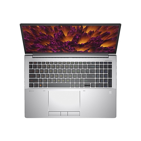 Draufsicht auf einen Laptop mit geÃ¶ffnetem Display. Der Bildschirm zeigt ein abstraktes Muster in Gelb und Lila. Die Tastatur und das GehÃ¤use sind silberfarben.