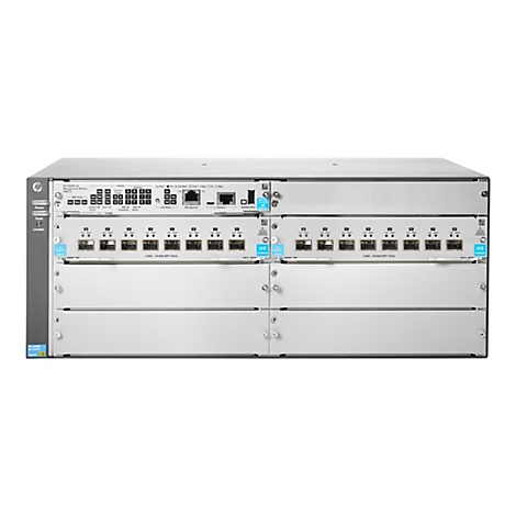 Un appareil réseau gris avec plusieurs modules et ports, étiqueté avec le nom de la marque et les informations sur le produit.