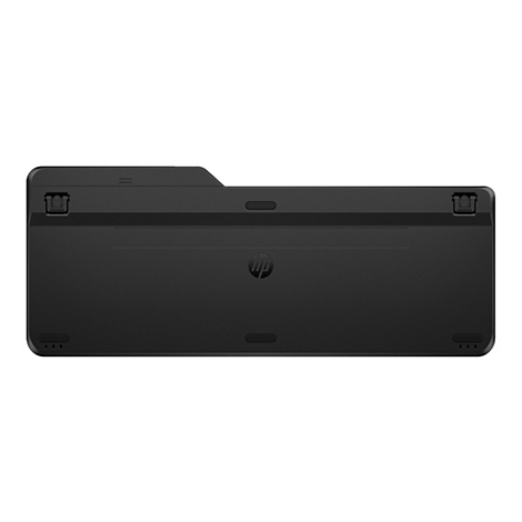 Rückseite einer schwarzen HP Tastatur mit Standfüßen und Firmenlogo.