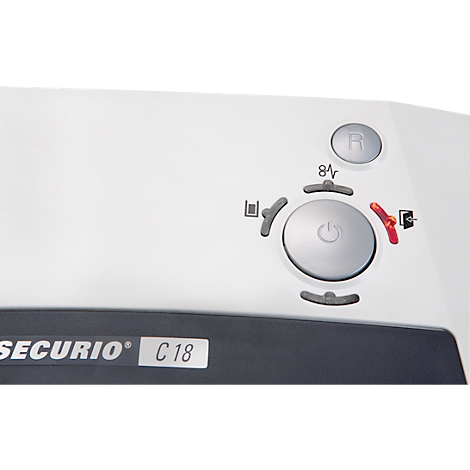 Detail shot of a paper shredder's control panel with an on/off switch and various symbols.