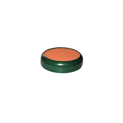 Round, green container with an orange foam pad. It is pictured against a white background.