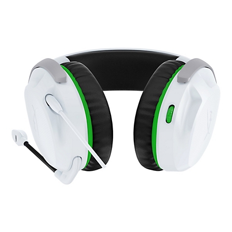 Casque de jeu blanc avec oreillettes noires, accents verts et microphone.