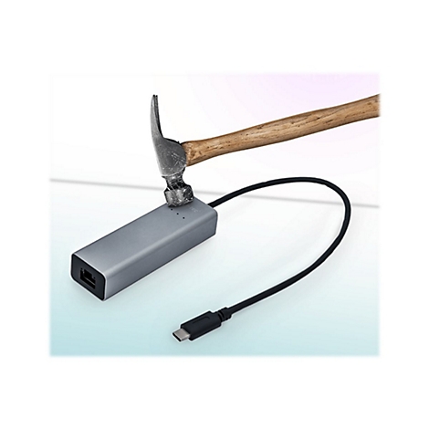 Un adaptateur USB-C argentÃ© est frappÃ© avec un marteau. Le marteau touche l'appareil, un cÃ¢ble noir s'Ã©loigne.
