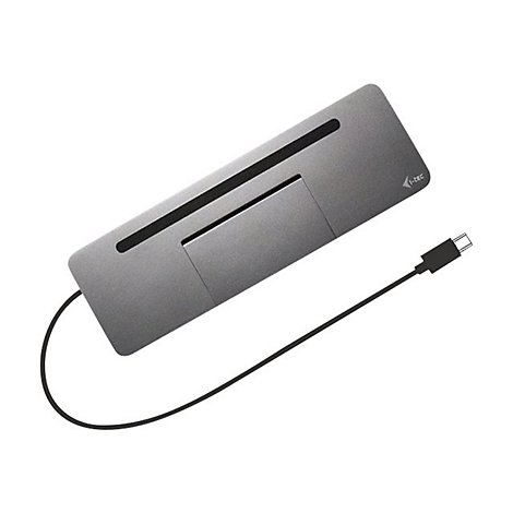 Station d'accueil USB-C grise avec cÃ¢ble noir. Un renfoncement Ã©troit en haut, Ã  cÃ´tÃ© d'une Ã©lÃ©vation rectangulaire.