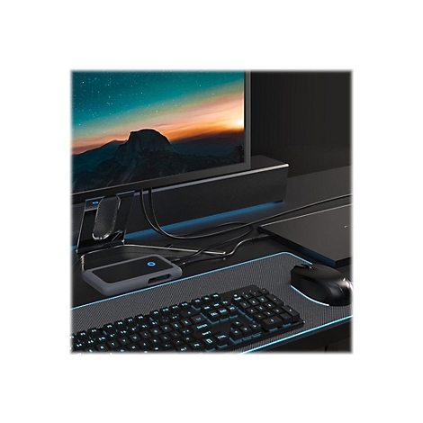 Schreibtisch mit Peripheriegeräten: Tastatur, Maus, Hub, Monitor. Alles schwarz mit blauen Akzenten.