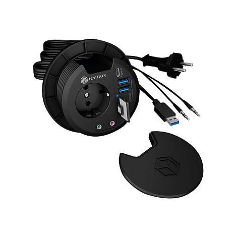 Schwarze Tischsteckdose mit USB-AnschlÃ¼ssen, Klinken- und Stromanschluss, Deckel daneben.