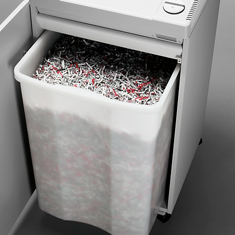 A paper shredder with a bin full of shredded paper.