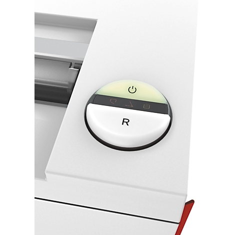 Nahaufnahme eines weißen, runden Knopfes mit grün leuchtenden Symbolen. Unten steht das "R".