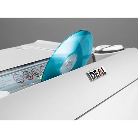 A blue CD is being inserted into a white IDEAL shredder.