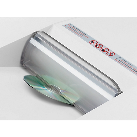 CD in protective sleeve, partially protruding from the packaging. Warning labels are depicted on the packaging.