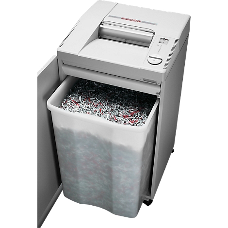 Shredder filled with shredded paper.