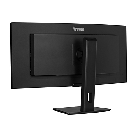 Moniteur iiyama noir vu de derrière, pied et logo visibles. L'écran est légèrement vu de derrière.