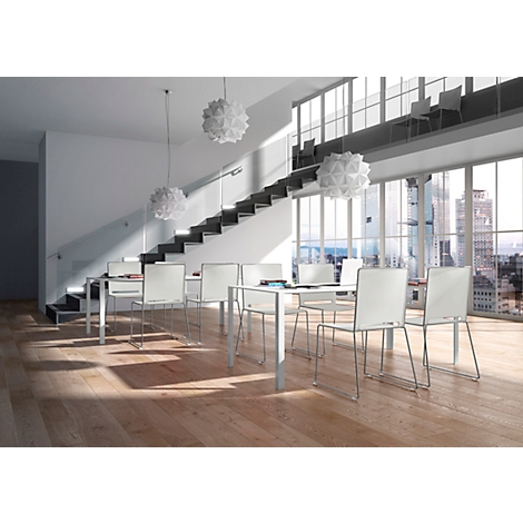 Modern dining area with light wood floor, white furniture, large windows, and hanging lamps.