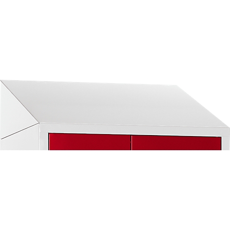 Close-up of a white cabinet with a red front.