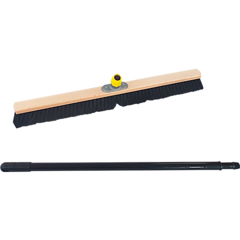 Broom with wooden handle and black bristles, below a black telescopic handle.