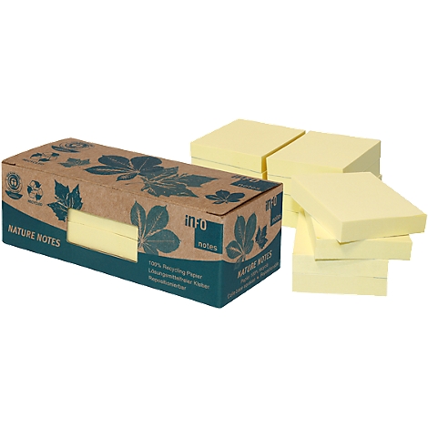 Box of sticky notes next to stacks of yellow pads. The box reads "NATURE NOTES".