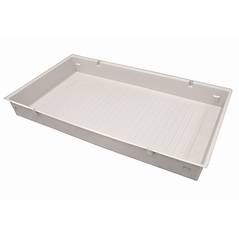 Rectangular white plastic tray with ribbed surface. Indentations on one side.