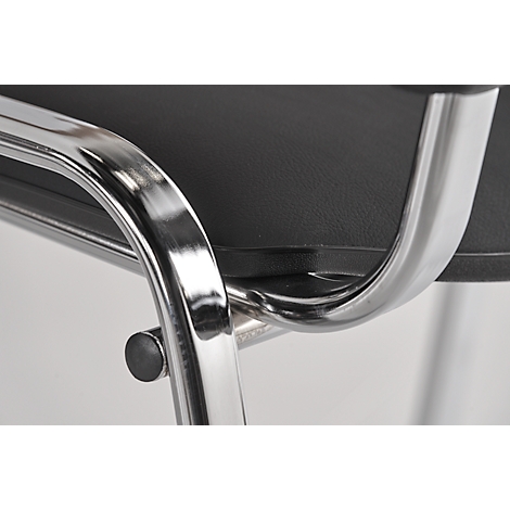 Close-up of a chair. Chrome frame, black seat.