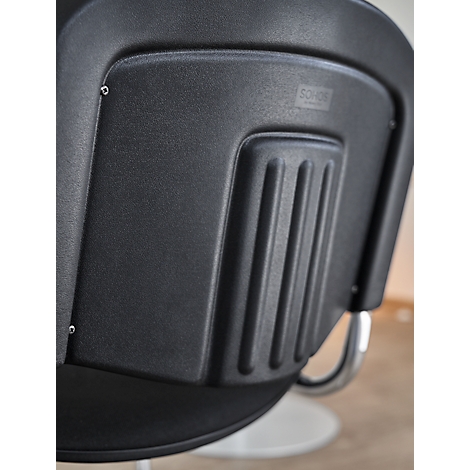 Detailed view of a black chair back featuring a rectangular design with vertical slats.