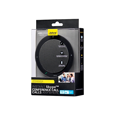 Haut-parleur Jabra noir dans son emballage, prÃªt pour les appels de confÃ©rence Skype.