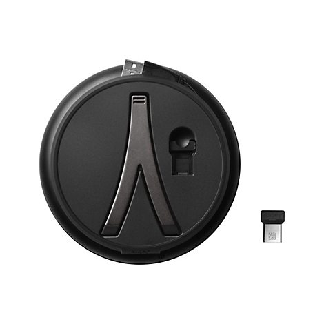 Station de charge Jabra noir rond avec connecteur USB intégré et dongle USB séparé. Support argenté au centre.
