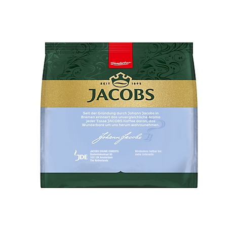 Jacobs Kaffeepackung mit dunkelgrünem Design, goldener Banderole und Markenschriftzug vor hellblauem Hintergrund.
