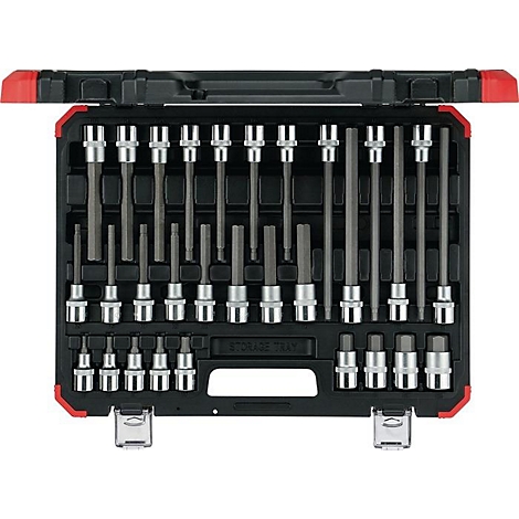 Une boîte à outils ouverte avec un ensemble de clés et d'accessoires. Mallette noire, cadre rouge, outils en métal.