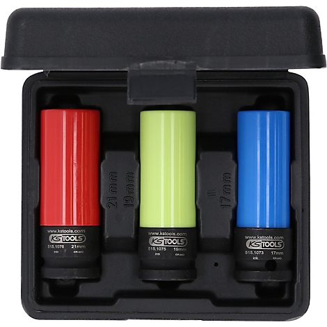 Boîte à outils avec trois douilles colorées : rouge, jaune et bleu. La taille et le fabricant sont indiqués sur chaque insert.