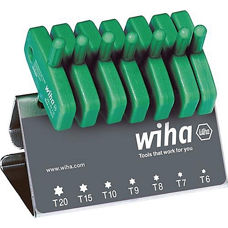 Un ensemble de clés torx vertes, debout dans un support avec le logo Wiha et des indications de taille.