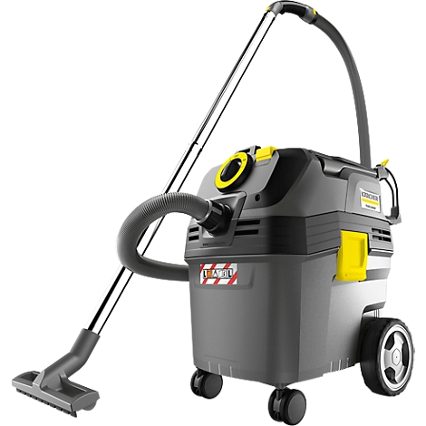Gray industrial vacuum cleaner, yellow accents, suction tube, wheels.