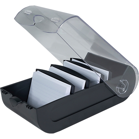 Boîte de rangement noire avec couvercle transparent, remplie de blocs-notes blancs.