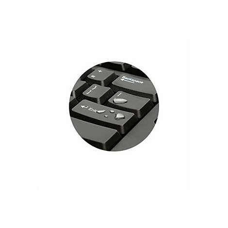 Gros plan sur un clavier noir avec des gouttes d'eau sur les touches.